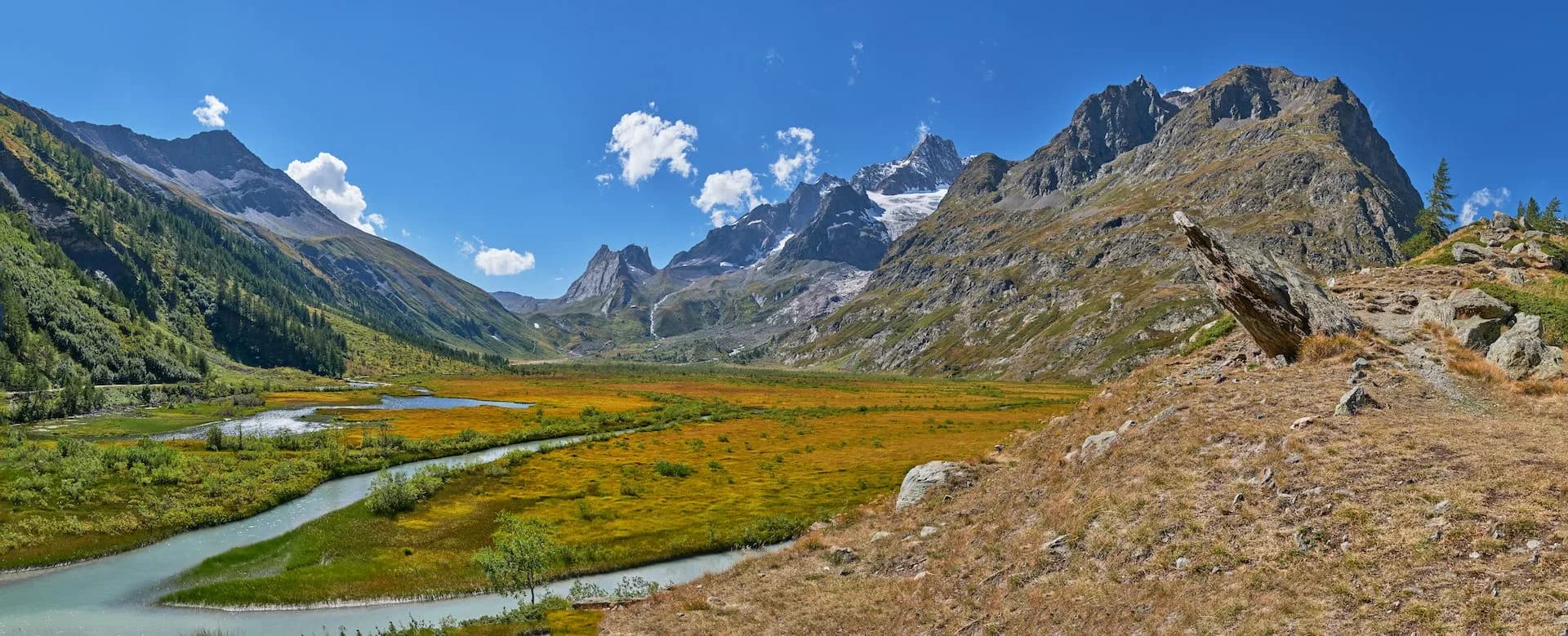 Scenic view of the Italian Alps from Mont Blanc massif, Val Veny valley, and Lake Combal.